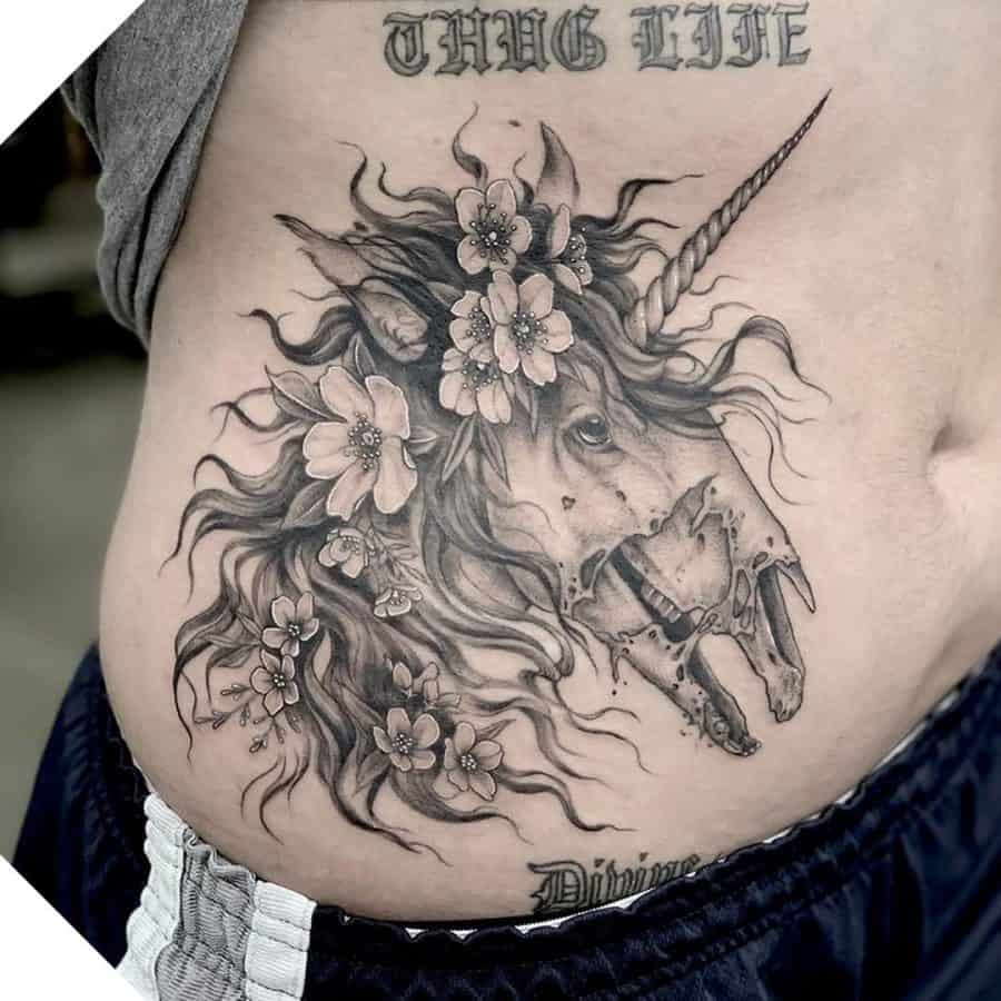 Side Piece Wild Hair Pretty Flowers Decomposing Face Black And Gray Unicorn Tattoo