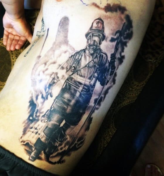 Side Rib Cage Guy's Firefighter Tattoo