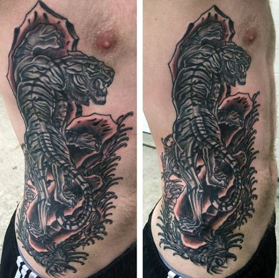 Side Rib Cage Saber Tooth Tiger Tattoo For Guys