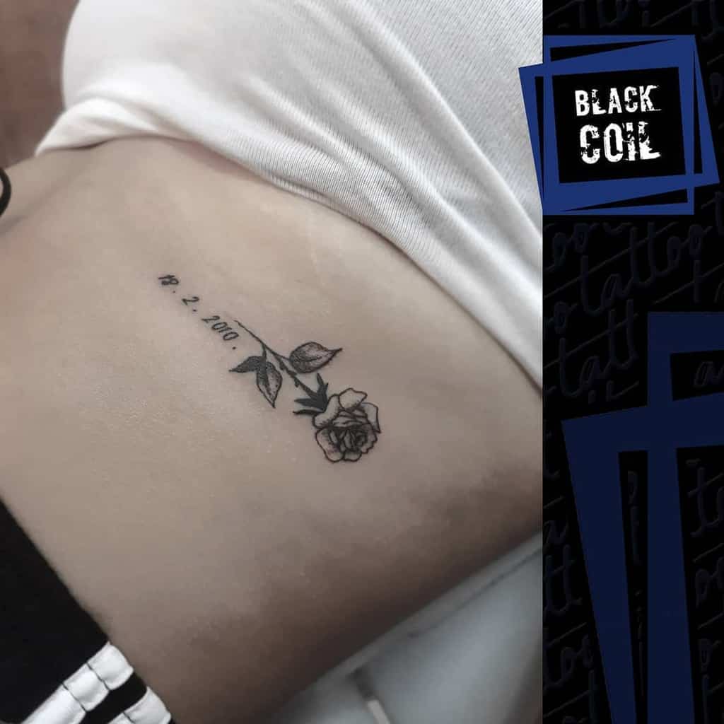 side tiny rose tattoos black_coil_tattoo