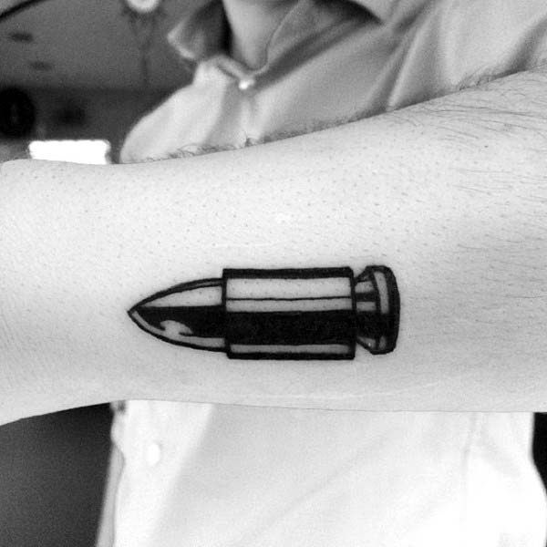 Simple Black Bullet Tattoo On Gentleman