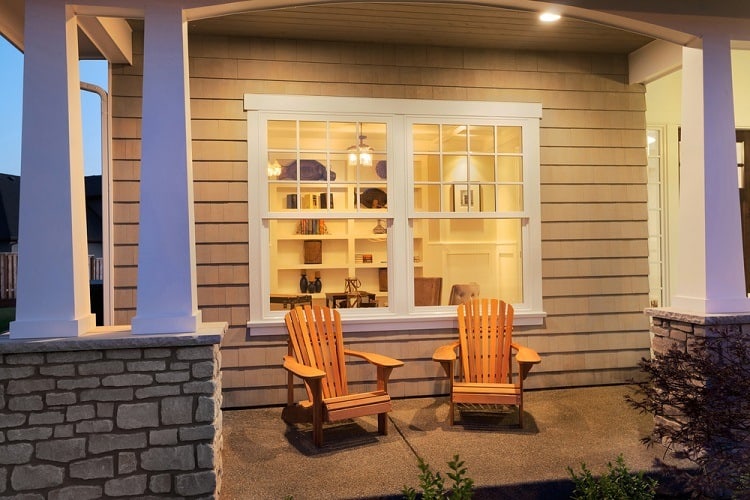 simple exterior window trim double bay window wood chairs front porch