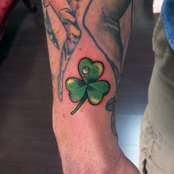 Simple Green Shamrock With Water Droplet Mens Arm Tattoo
