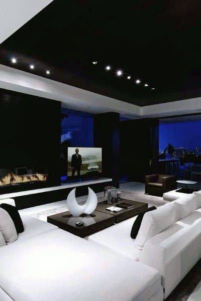 luxury living room with gas fireplace and white sofa 
