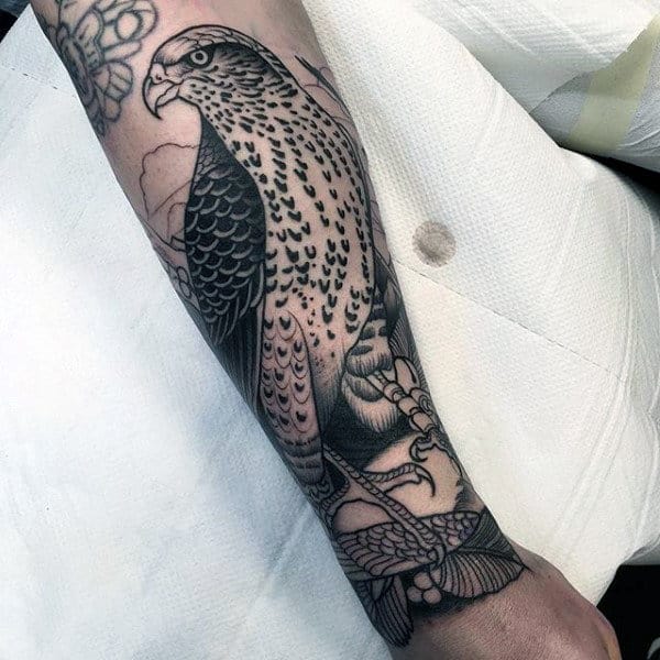 Simple Outline Tattoo Of Hawk On Forearm On Male