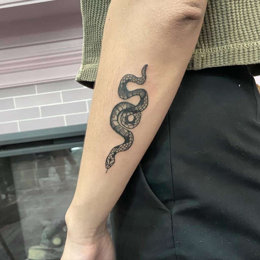 simple snake arm tattoo mclametattoos