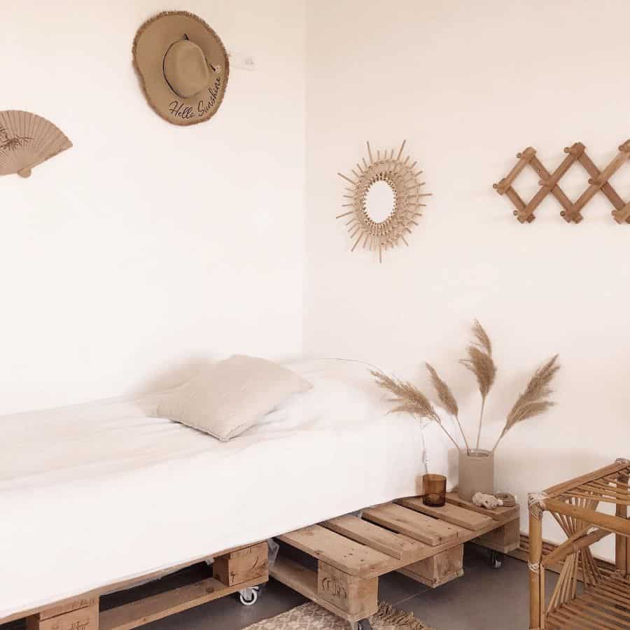 boho style spare bedroom with wood pallet bed frame