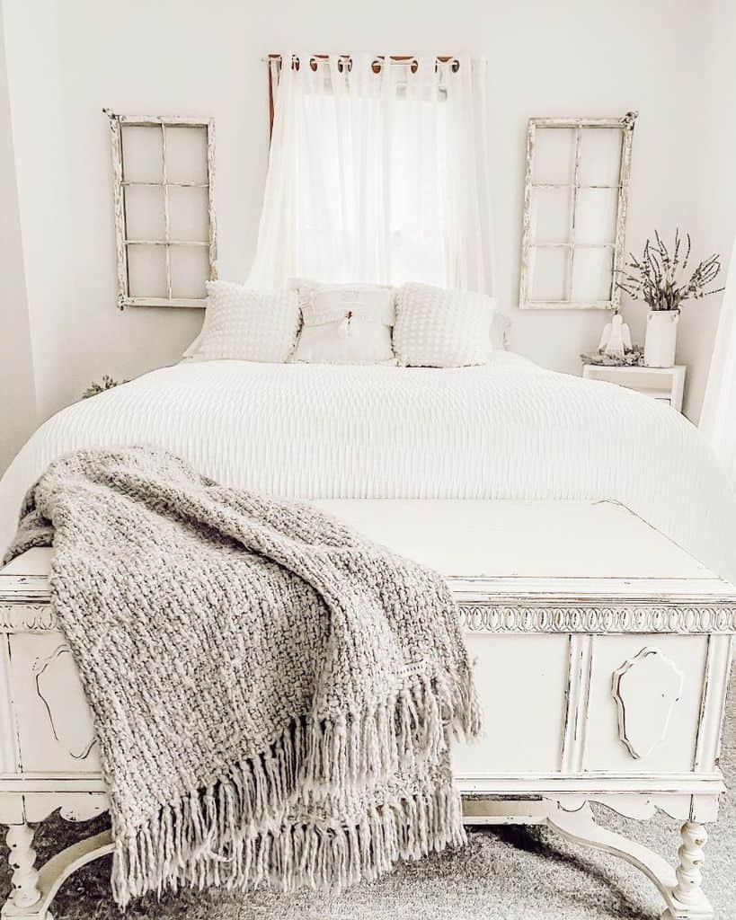 vintage white spare bedroom 