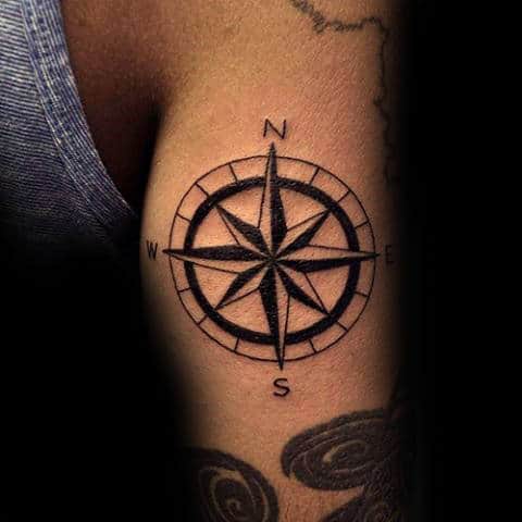 Simple Traditional Nautical Star Back Of Upper Arm Tattoo On Man