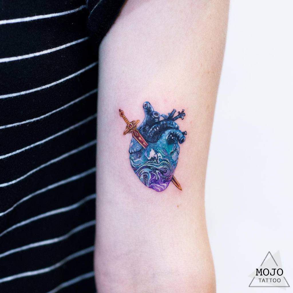 simple upper arm tattoos for women mojo_tattoo