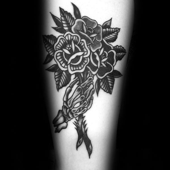 Skeleton Hand Holding Bouquet Of Flowers Traditional Mens Arm Tattoo
