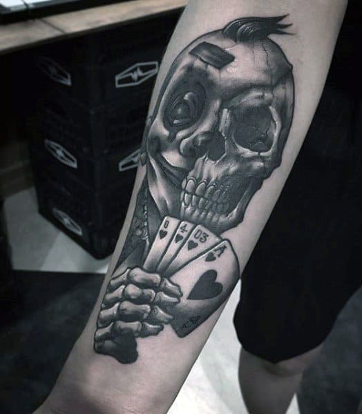 Skeleton Hand With Skull And Playing Cards Inner Forearm Tattoos For Men