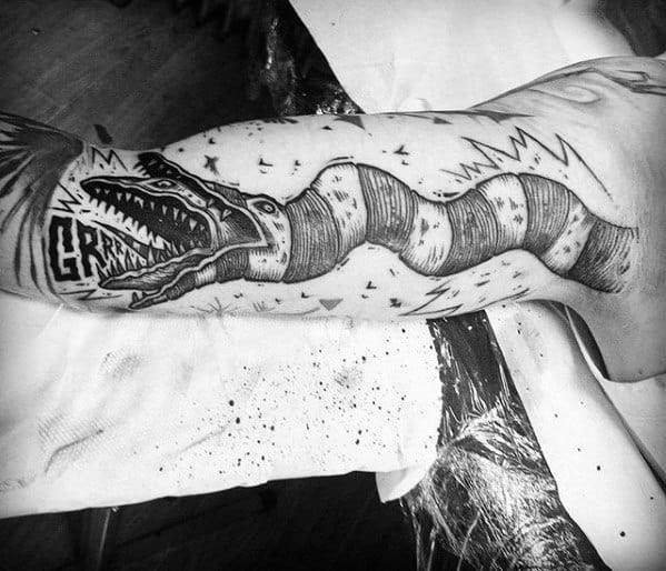 Sketched Beetlejuice Snakeworm Tattoo On Inner Arm For Men