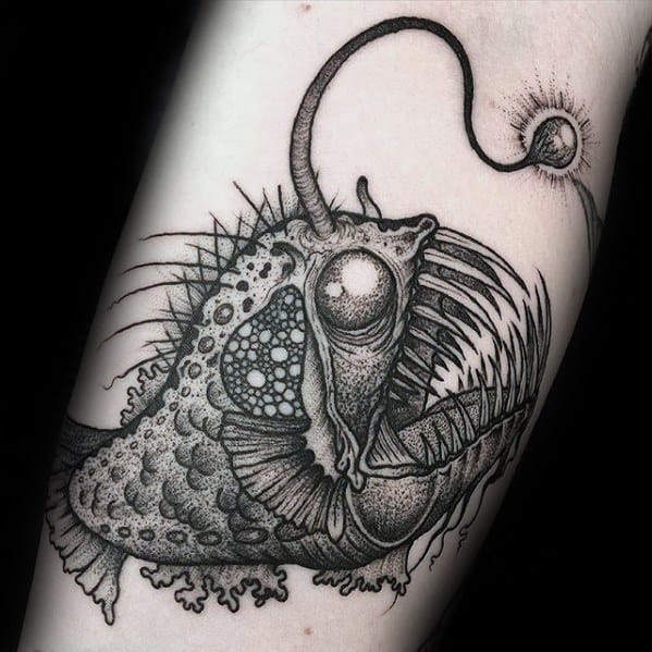 Sketeched Black And Grey Arm Guys Angler Fish Tattoo Deisgns
