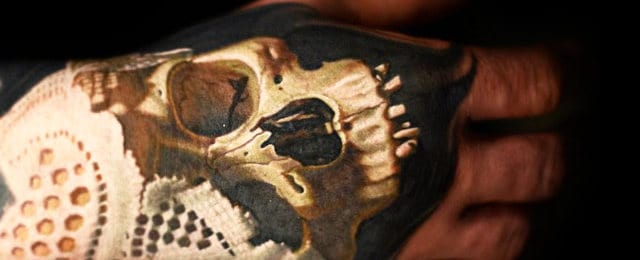 80 Skull Hand Tattoo Designs for Men