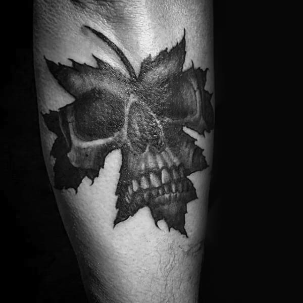 Skull Inside Maple Leaf Black Ink Guys Arm Tattoos