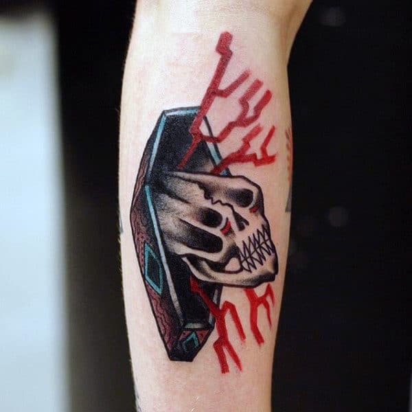 Skull Popping Out Of Coffin Mens Tattoo