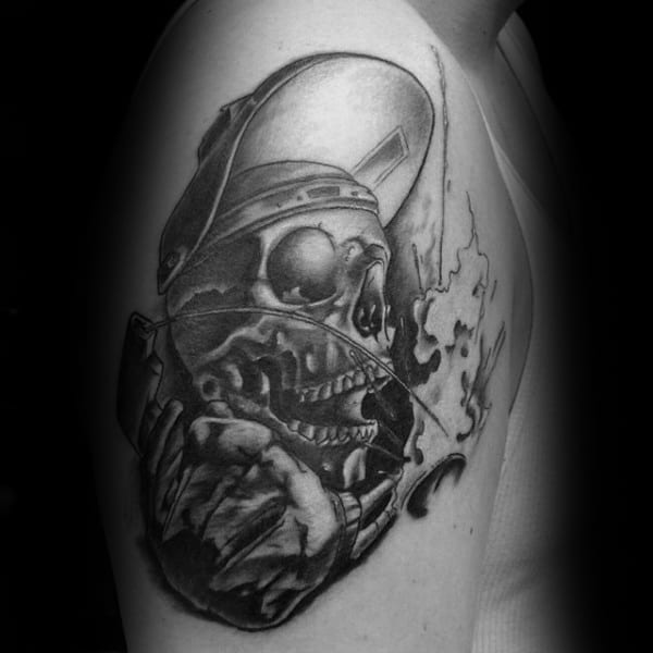Skull Welder Male Upper Arm Flaming Tattoo Ideas