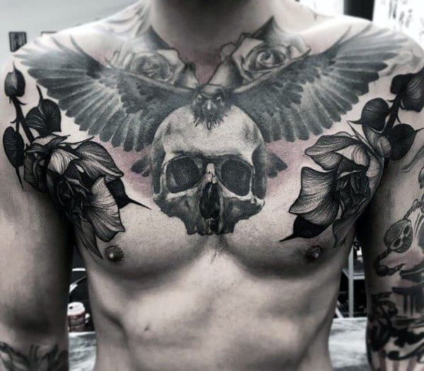 Skull Wings With Roses Male Chest Tattoo