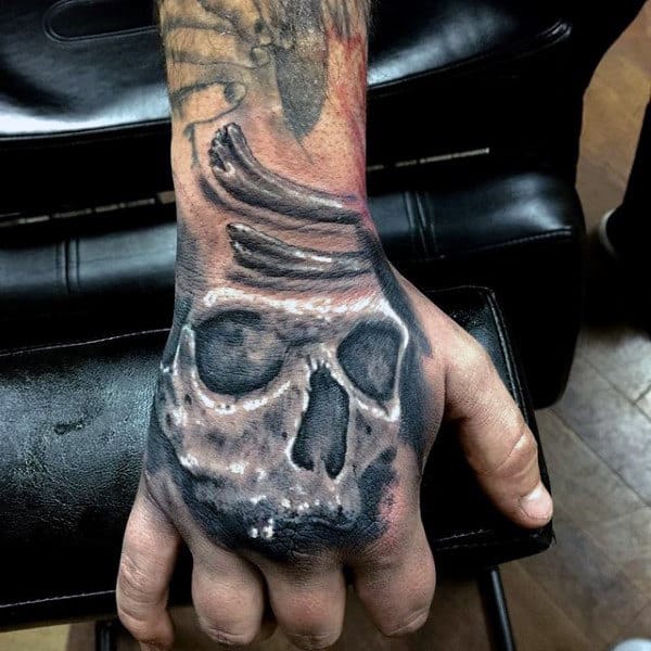 Skull With Bones Mens Hand Tattoo