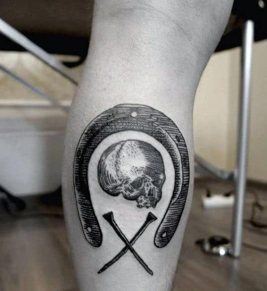 Skull With Crossbone Nails Guys Horseshoe Leg Calf Tattoos