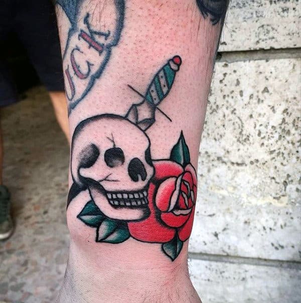 Skull With Dagger And Red Rose Male Traditional Arm Tattoos