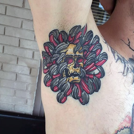 Skull With Leafy Growth Tattoo Guys Armpit