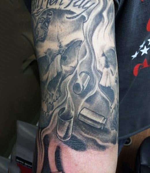 Skull With Smoking Bullet Mens Tattoo Designs