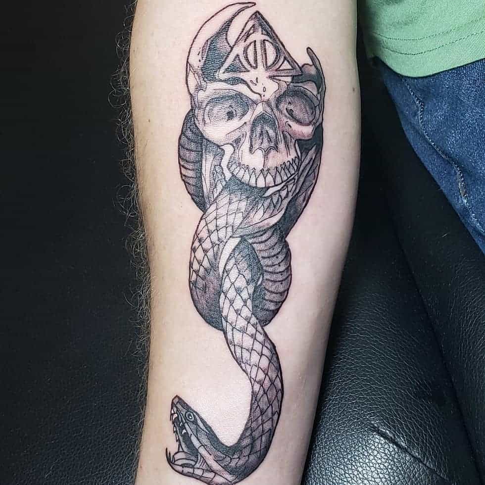 skull with snake deathly hallows harry potter tattoo