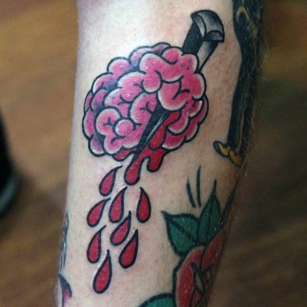Slicing Through Bloody Brain Tattoo Male Arms