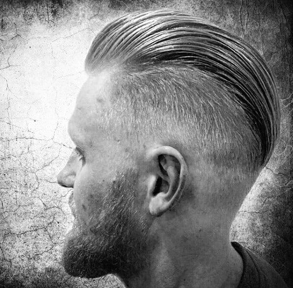 Slicked Back Mens Hair With Skin Fade