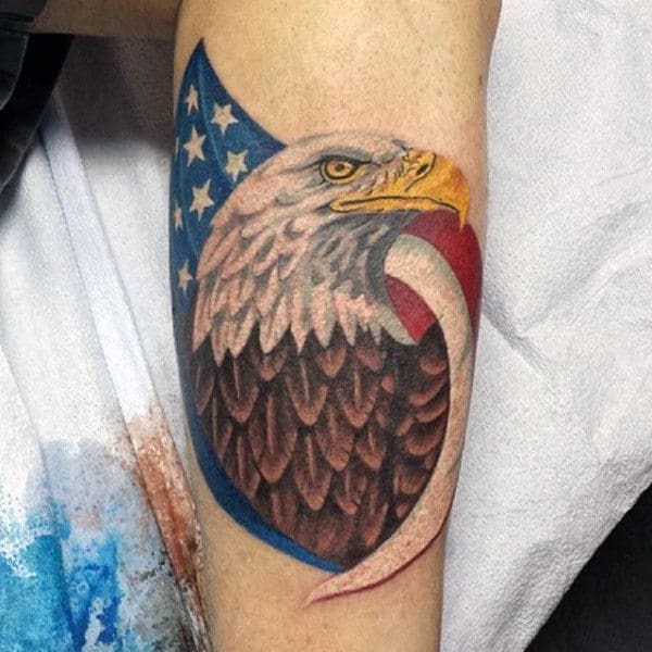 Smal Subdued American Flag Tattoo On Man