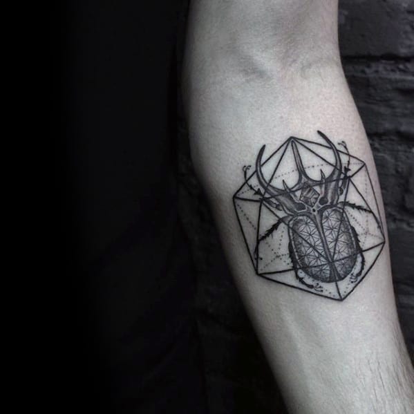 small 3d geometric scarab bettle inner forearm tattoos for gentlemen