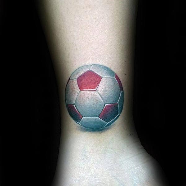 Small 3d Mens Lower Leg Soccerball Tattoo With White And Red Ink