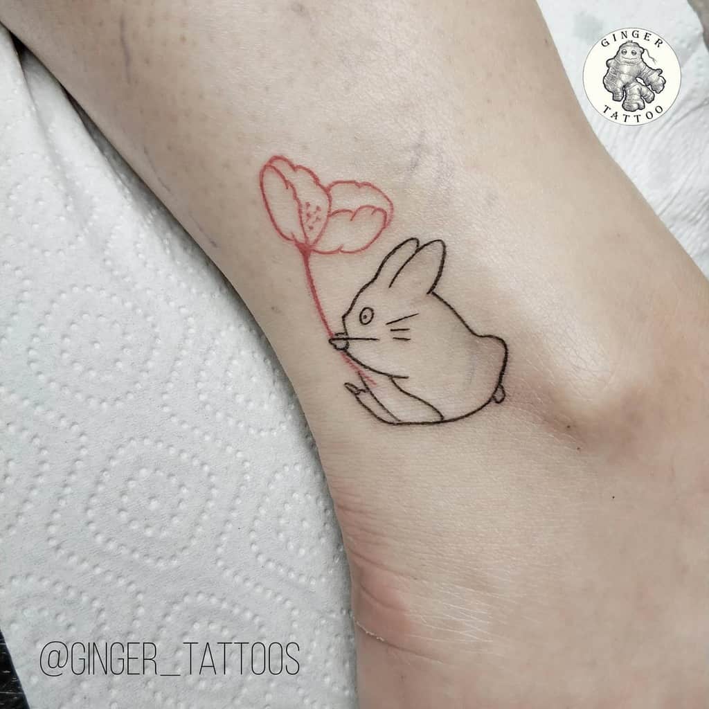 Fine line Chibi Totoro tattoo located on the inner arm