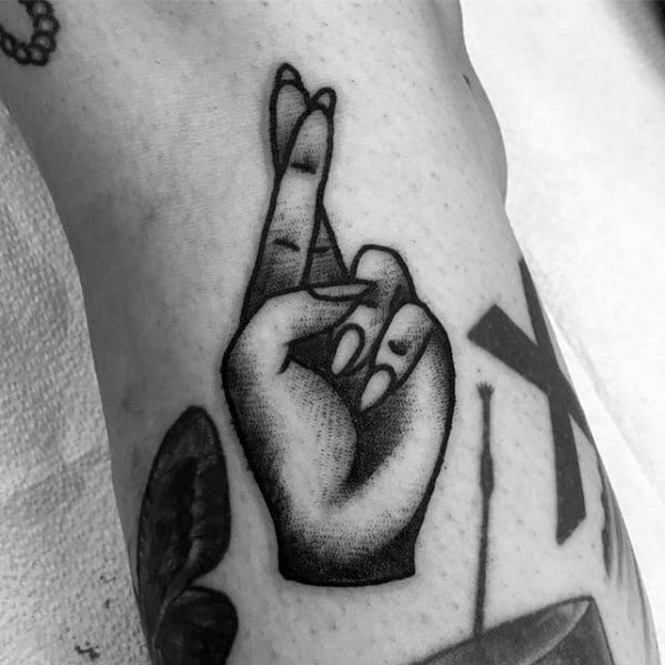 Fingers crossed temporary tattoo