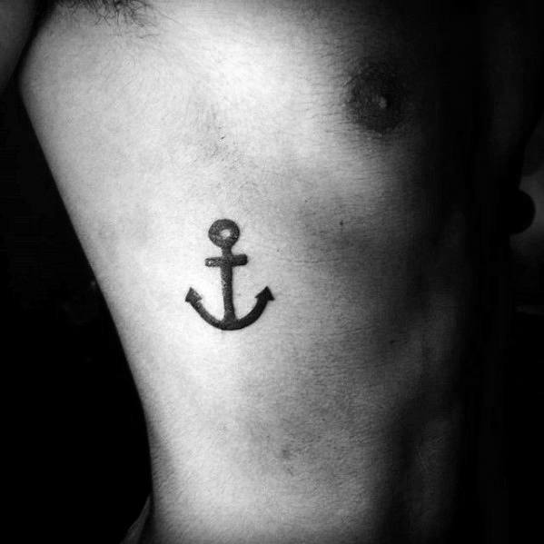 small black ink rib cage side anchor tattoo ideas for men