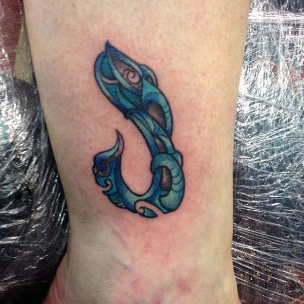 Small Blue Tribal Fish Hook Tattoo On Wrist For Men