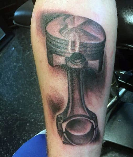 Small Cool Male Tattoo Of Pistons