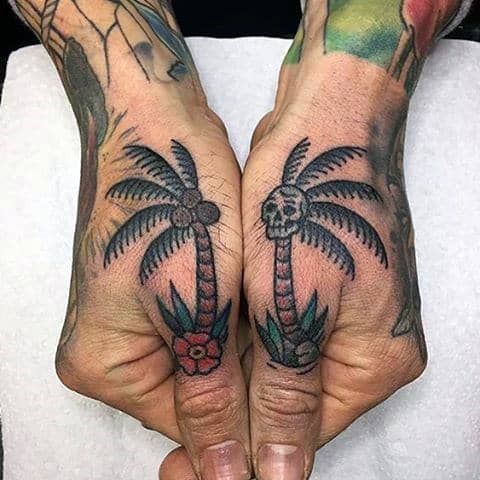 Small Double Palm Tree With Skull Tattoo On Hands For Men
