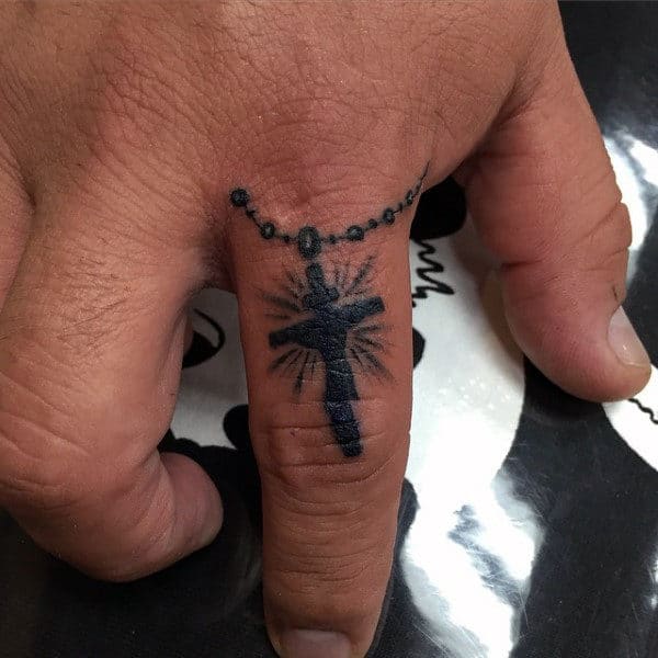 Small Finger Male Cross Tattoos With Rosary Beads