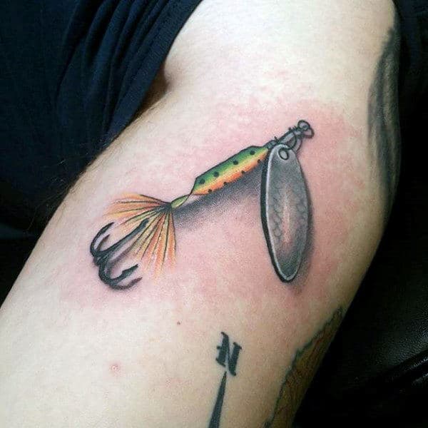 Small Fish Hook Tattoo For Males On Bicep Of Arm