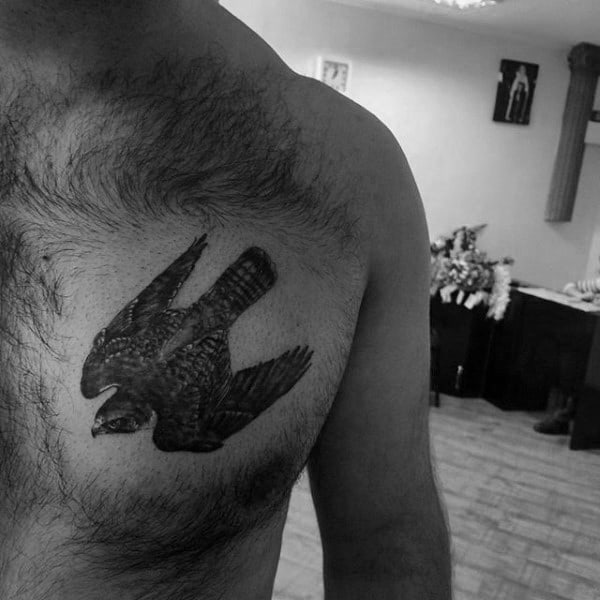Small Flying Falcon Chest Tattoos For Men