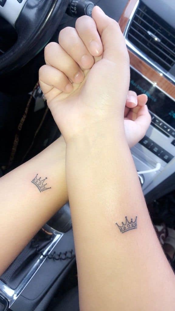 Small Forearm Crown Friendship Tattoo