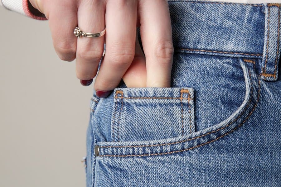 small front pocket on denim pants