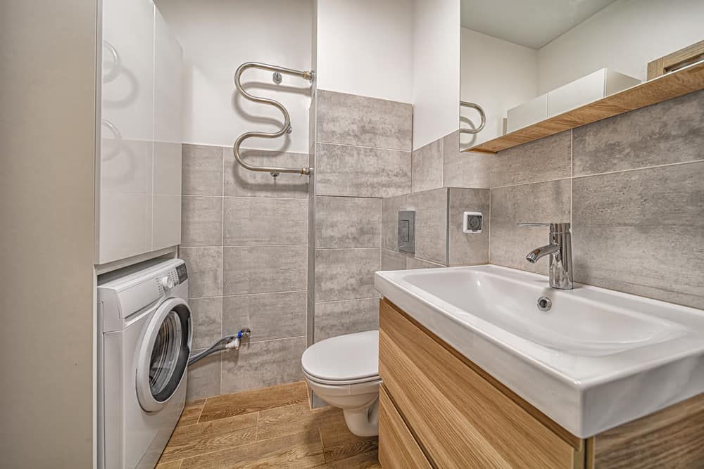 contemporary small bathroom with washing machine 