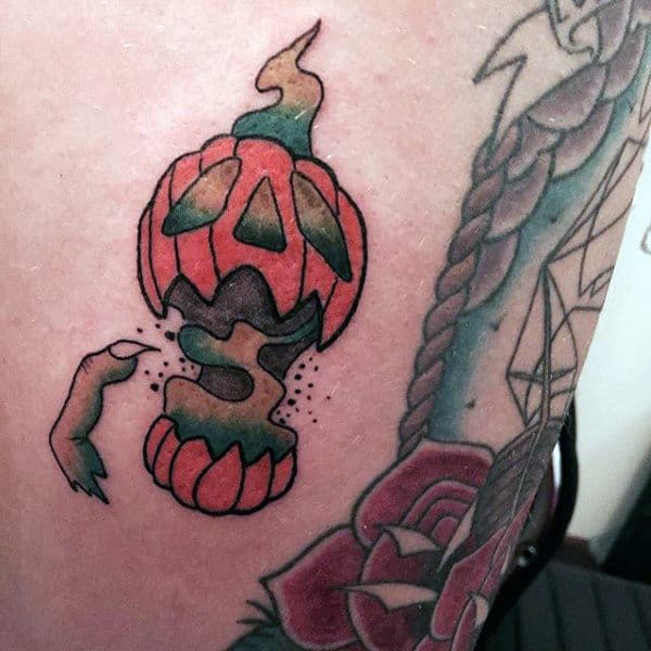 Small Guys Haunted Pumpkin Tattoo With Ghosts