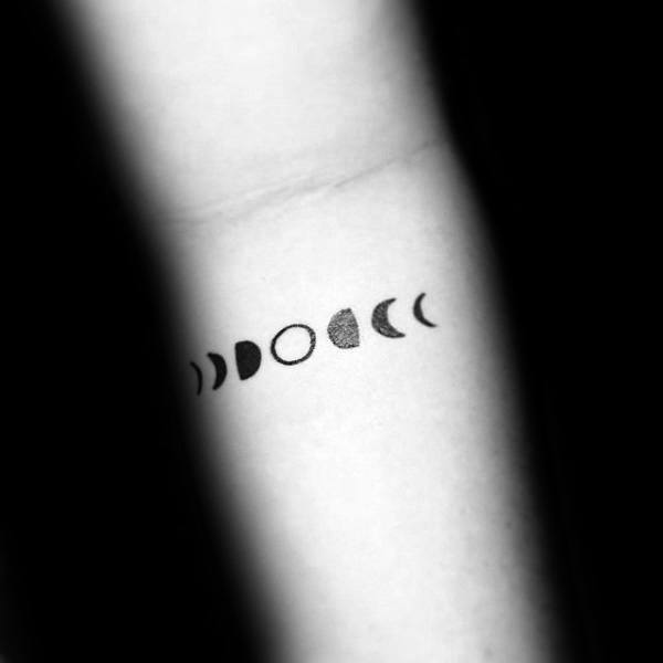 Small Guys Simple Moon Phases Forearm Tattoo Design Inspiration
