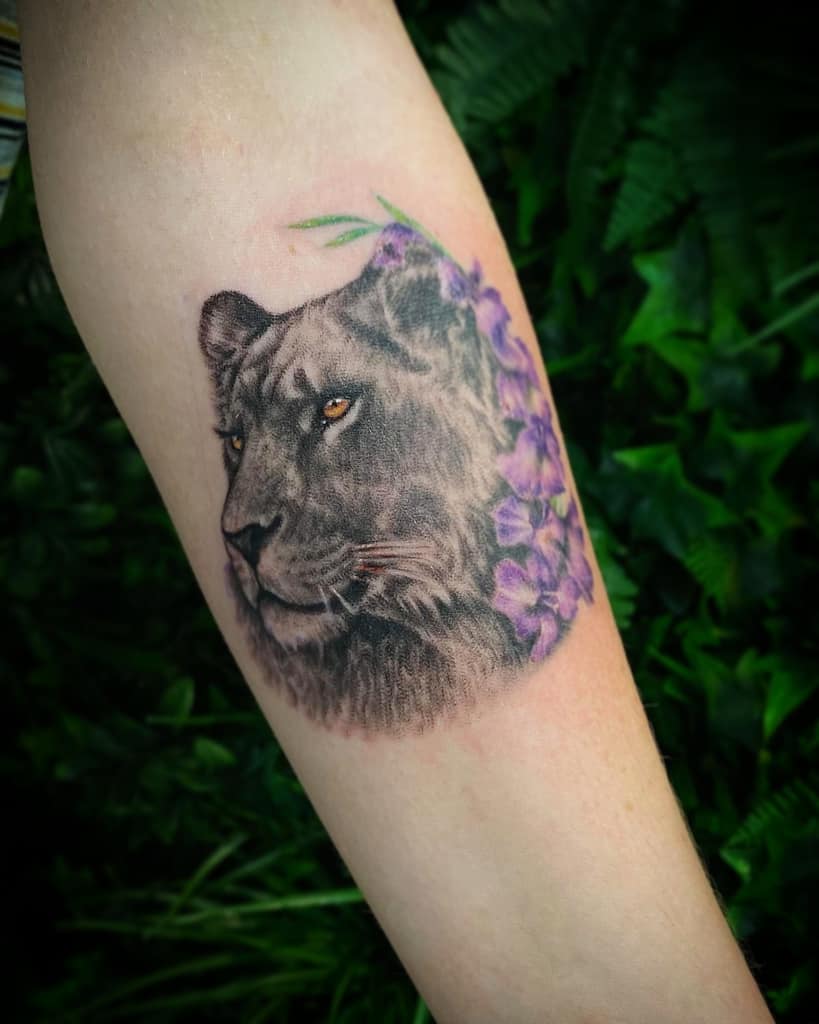 Small Ink Lion Tattoo