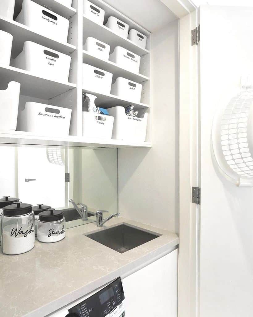 small laundry room sink wall storage 